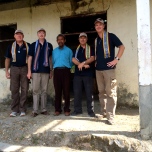 John Fraser, Mark Fraser, Phil Singer and Paul Singer with Father Tiago exploring possible sites for a pre-school.
